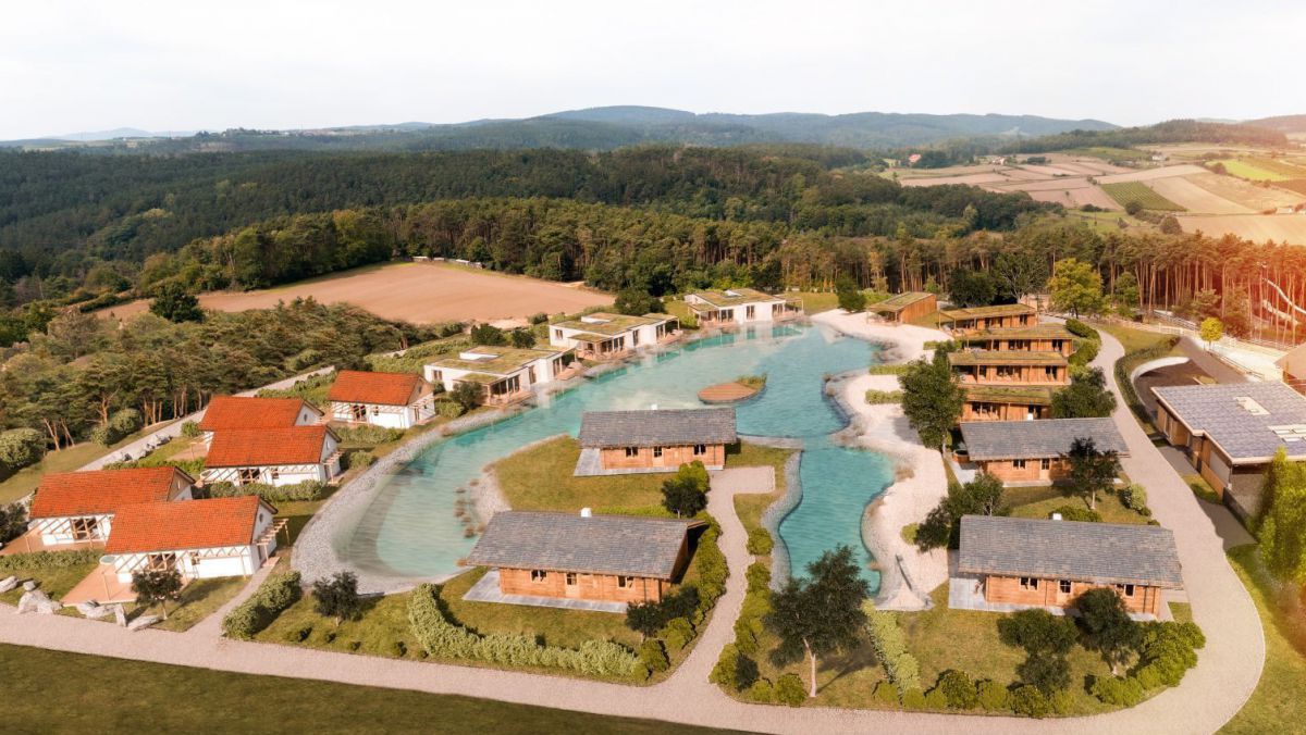 Rendering der Urlaubsanlage: U-förmiger Teich und rundum die Chalets.