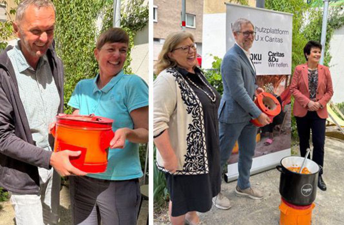 5 Personen bei der Präsentation eines roten Kochofens, der etwa die Grüße eines Kochtopfes hat.